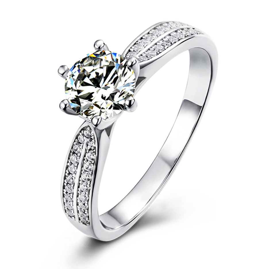 stříbrný zásnubní prsten kulatý moissanit  